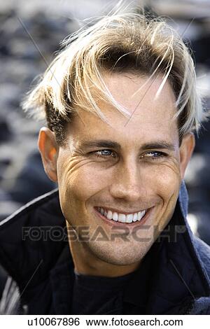 Portrait of blond Caucasian mid-adult male smiling. View Large Photo Image Stock Photograph - Portrait of blond Caucasian mid-adult male smiling.. Fotosearch
