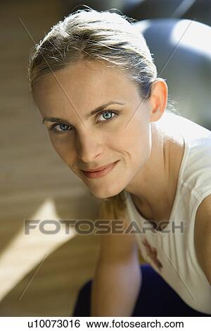 Portrait of prime adult female Caucasian at gym. View Large Photo Image Stock Photograph - Portrait of prime adult female Caucasian at gym.. Fotosearch
