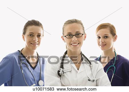 Portrait of smiling Caucasian women medical healthcare workers in uniforms against white background. View Large Photo Image Stock Photo - Portrait of smiling Caucasian women medical healthcare workers in uniforms against white background.. Fotosearch - Search Stock Images, Poster Photographs, Pictures, and Clip Art Photos