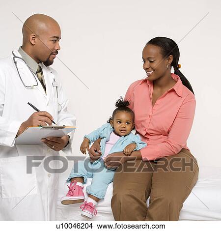 Picture - African-American mother and baby girl with male pediatrician. . Fotosearch