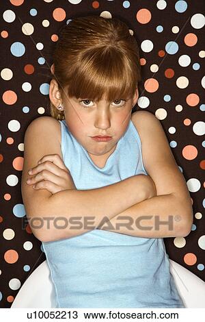 Caucasian female child pouting with arms crossed. View Large Photo Image Stock Image - Caucasian female child pouting with arms crossed.. Fotosearch