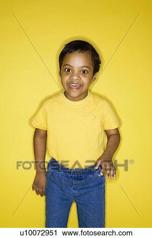 Stock Image - Hispanic male child smiling.. Fotosearch