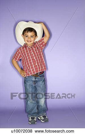 Hispanic male child wearing cowboy hat. View Large Photo Image Stock Photo - Hispanic male child wearing cowboy hat.. Fotosearch