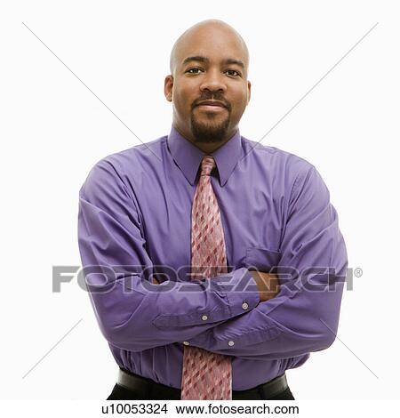 African-American businessman portrait with arms crossed looking at viewer. View Large Photo Image Picture - African-American businessman portrait with arms crossed looking at viewer.. Fotosearch