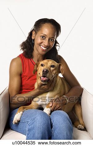 Prime adult female African American pointing with hand on hip. View Large Photo Image Stock Photography - Prime adult female African American pointing with hand on hip.. Fotosearch