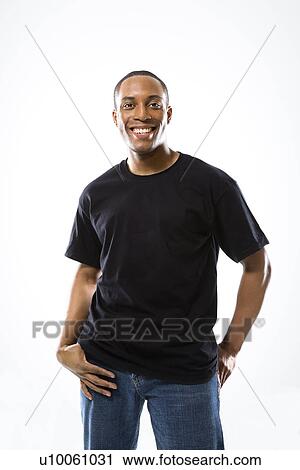 Stock Image - Young African-American male smiling.. Fotosearch