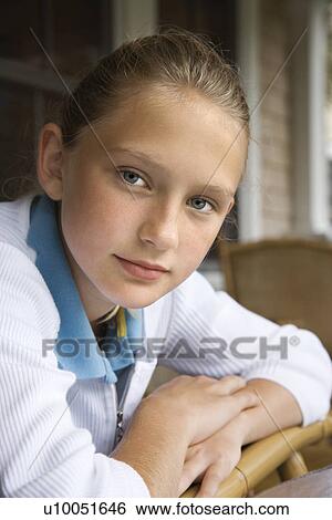 Portrait of Caucasian pre-teen girl looking at viewer. View Large Photo Image Stock Photograph - Portrait of Caucasian pre-teen girl looking at viewer.. Fotosearch