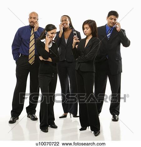 Stock Image - Multi-ethnic business group of men and women standing talking on cell phones.. Fotosearch