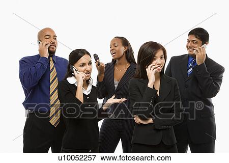 Stock Photo - Multi-ethnic business group of men and women standing talking on cell phones.. Fotosearch