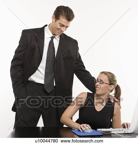 Caucasian mid-adult man sexually harassing woman sitting at computer. View Large Photo Image Stock Image - Caucasian mid-adult man sexually harassing woman sitting at computer.. Fotosearch