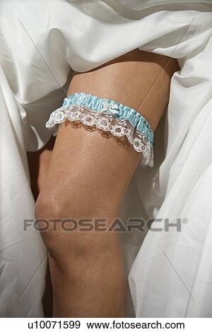 Close-up image of bride's leg with garter. View Large Photo Image Stock Photo - Close-up image of bride's leg with garter.. Fotosearch
