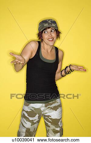 Hispanic mid-adult woman shrugging. View Large Photo Image Stock Image - Hispanic mid-adult woman shrugging.. Fotosearch