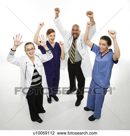 Stock Photo - Full-length portrait of African-American man and Caucasian women medical healthcare workers in uniforms cheering with arms raised standing against white background.. Fotosearch - Search Stock Photography, Print Pictures, Images, and Photo Clip Art