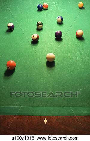 Green billiards table with pool balls spread out. View Large Photo Image Stock Photo - Green billiards table with pool balls spread out.. Fotosearch