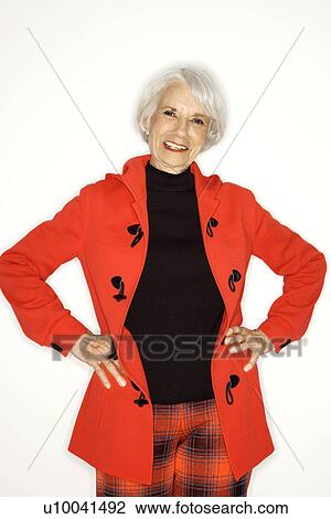Stock Image - Caucasian mature adult female standing looking at viewer.. Fotosearch