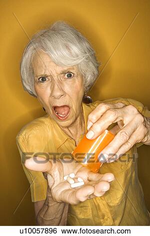 Caucasian mature adult female with medication. View Large Photo Image Stock Photograph - Caucasian mature adult female with medication.. Fotosearch