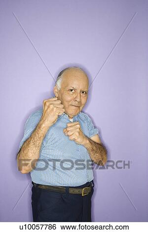 Caucasian mature adult male making fists. View Large Photo Image Stock Photograph - Caucasian mature adult male making fists.. Fotosearch