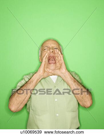 Caucasian mature adult male with hands to mouth yelling. View Large Photo Image Stock Photo - Caucasian mature adult male with hands to mouth yelling.. Fotosearch