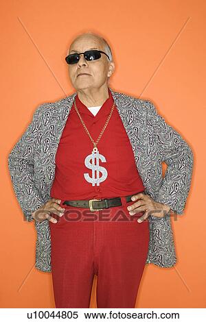 Mature adult Caucasian male wearing money sign necklace. View Large Photo Image Stock Photography - Mature adult Caucasian male wearing money sign necklace.. Fotosearch