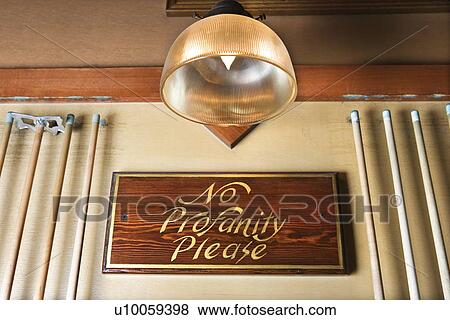 Low angle of sign in nightclub requesting no profanity. View Large Photo Image Stock Photo - Low angle of sign in nightclub requesting no profanity.. Fotosearch