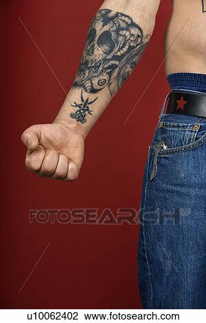 Caucasian mid-adult man's arm with tattoo. View Large Photo Image Stock Image - Caucasian mid-adult man's arm with tattoo.. Fotosearch