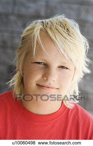 Stock Photo - Head shot of Caucasian teen boy looking at viewer.. Fotosearch