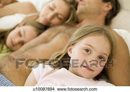 Picture - Family at home. Fotosearch