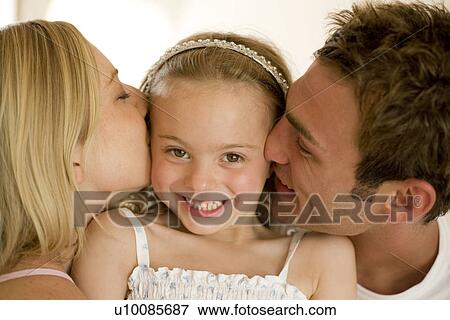 Stock Photo - Family at home. Fotosearch