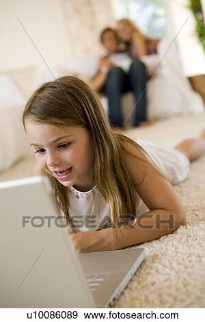 Stock Photo - Family at home. Fotosearch