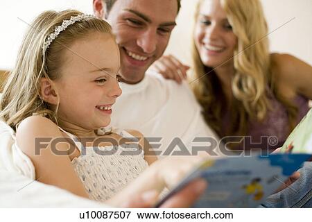 Stock Photo - Family at home. Fotosearch
