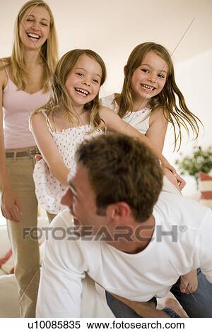 Family at home View Large Photo Image Stock Photography - Family at home. Fotosearch