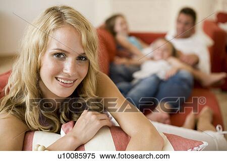 Stock Photography - Family at home. Fotosearch
