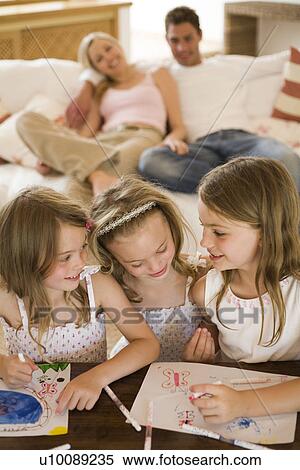 Stock Photography - Family at home. Fotosearch