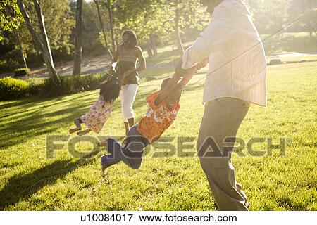 Family in park View Large Photo Image Stock Photo - Family in park. Fotosearch