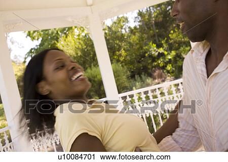 Stock Image - Young couple dancing. Fotosearch