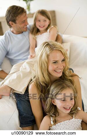 Stock Photo - Family at home. Fotosearch