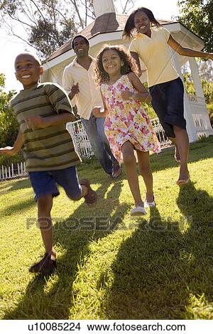 Family in park View Large Photo Image Picture - Family in park. Fotosearch