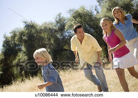 Picture - Family in park. Fotosearch