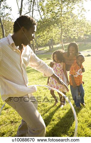 Family in park View Large Photo Image Stock Image - Family in park. Fotosearch