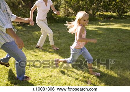 Family in park View Large Photo Image Stock Photograph - Family in park. Fotosearch