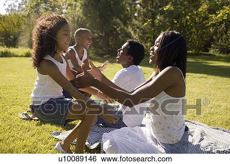 Family in park View Large Photo Image Stock Photograph - Family in park. Fotosearch