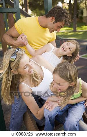 Stock Photography - Family in Park. Fotosearch