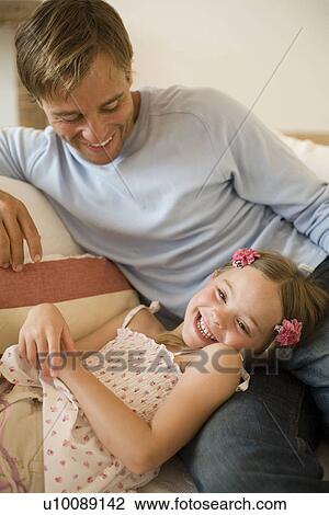 Father and daughter at home View Large Photo Image Stock Image - Father and daughter at home. Fotosearch