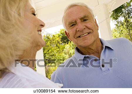 Mature couple in park View Large Photo Image Picture - Mature couple in park. Fotosearch