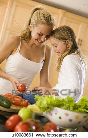 Mother and daughter at home View Large Photo Image Stock Image - Mother and daughter at home. Fotosearch