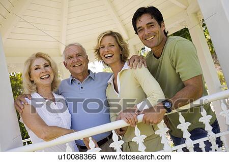 Stock Photograph - Two generations in park. Fotosearch