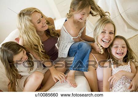 Stock Image - Family at home. Fotosearch