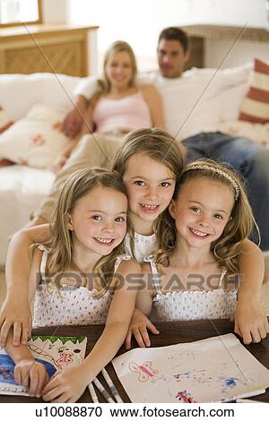 Stock Image - Family at home. Fotosearch