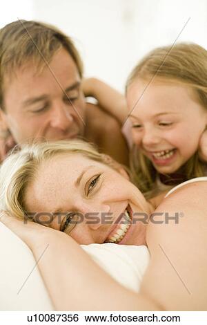 Family at home View Large Photo Image Stock Photograph - Family at home. Fotosearch