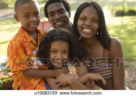Stock Photo - Family in park. Fotosearch